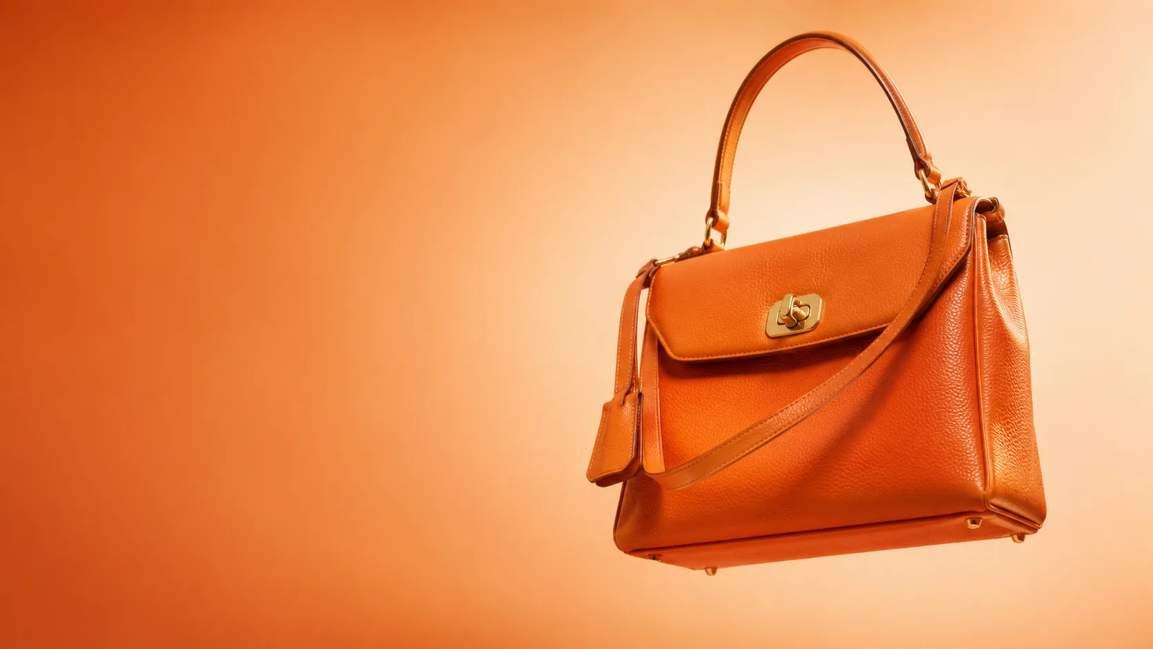 Orange leather handbag from the Pelsunisexkloset accessories rail