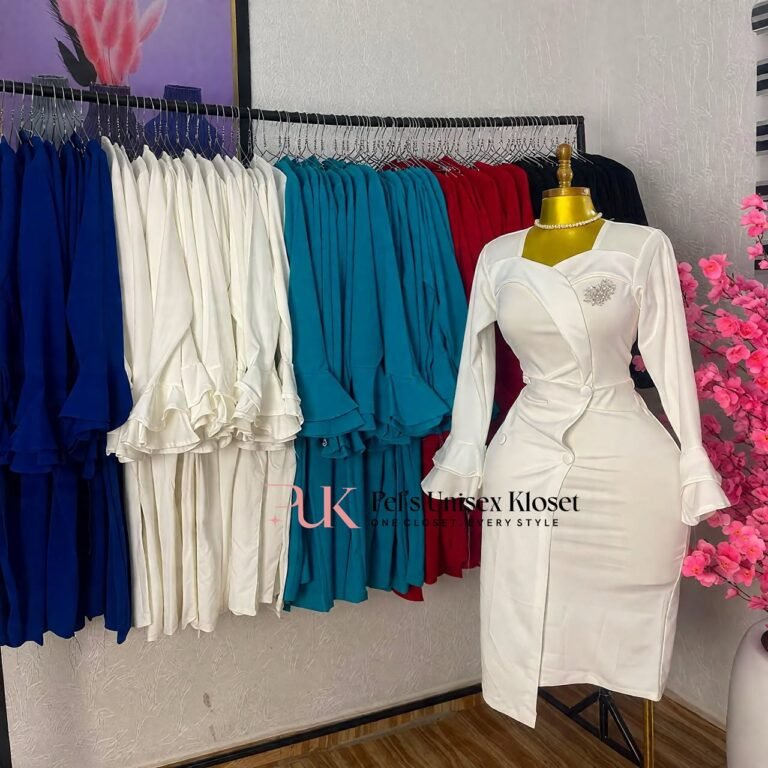 White wrap-front corporate pencil dress with sweetheart neckline, waist buttons and ruffle cuffs