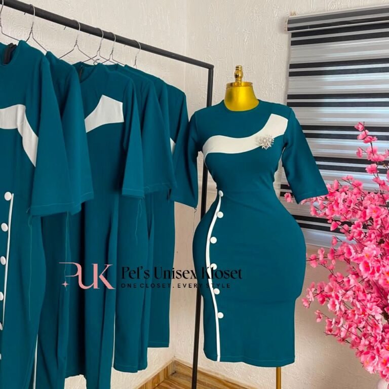 Teal corporate pencil dress with a white curved chest panel and white buttons down the side