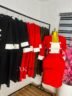 Red corporate dress with a white bib front panel, white cuffs and white buttons