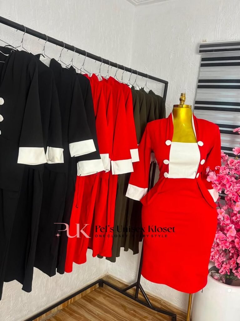 Red corporate dress with a white bib front panel, white cuffs and white buttons