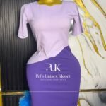 Two-tone corporate bodycon dress in light lilac and deep purple with an asymmetric waist seam