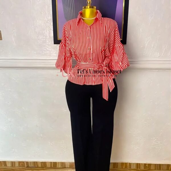Red and white striped peplum shirt with a tie waist and gathered sleeves, worn with black wide-leg trousers