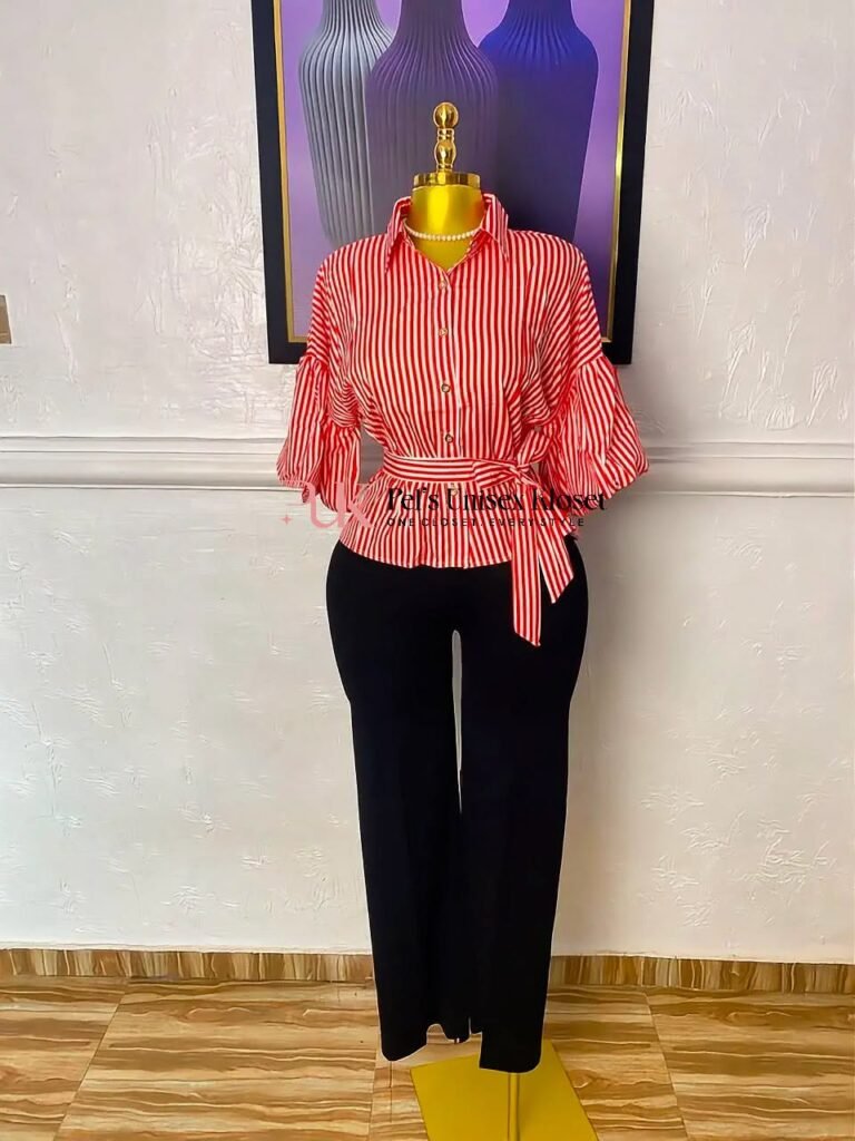 Red and white striped peplum shirt with a tie waist and gathered sleeves, worn with black wide-leg trousers