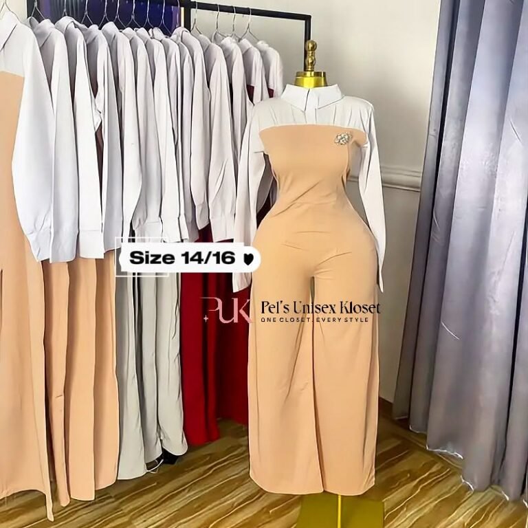 Nude strapless wide-leg jumpsuit worn under a white collared long-sleeve shirt