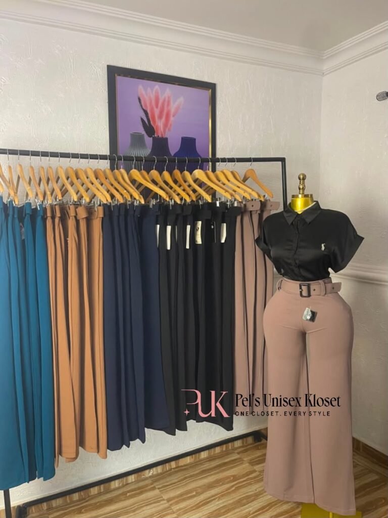 Mauve high-waist belted wide-leg corporate trousers shown with a rack of the same trouser in five colours